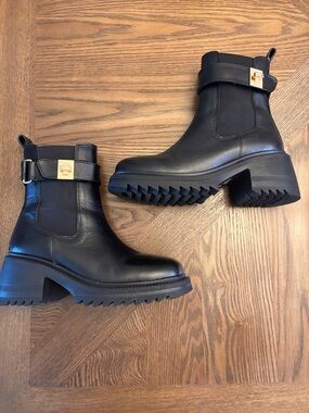 Steve Madden Black Leather Lug Sole Ankle Boots with Gold Buckle